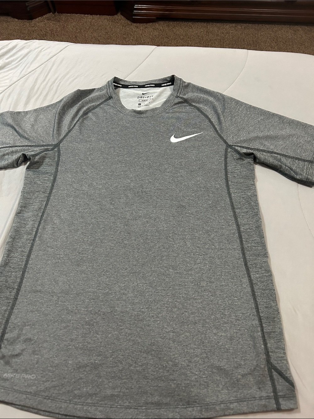Nike Gray Short Sleeve Dri-FIT Athletic Shirt with White Swoosh